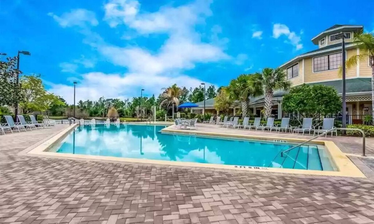 West Kissimmee Condo | 9.1 miles from Disney World, Sleeps 8-10, heated pool, hot tub, private balcony