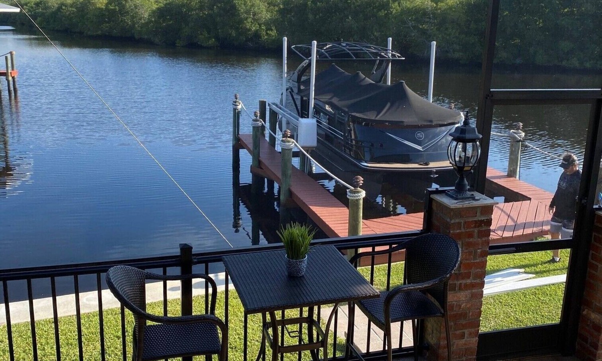 Fort Myers House | Beautiful ranch home on quiet canal with ocean access and spa.