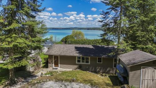 Rapid City House | Beautiful Torch Lake House with Beach Access