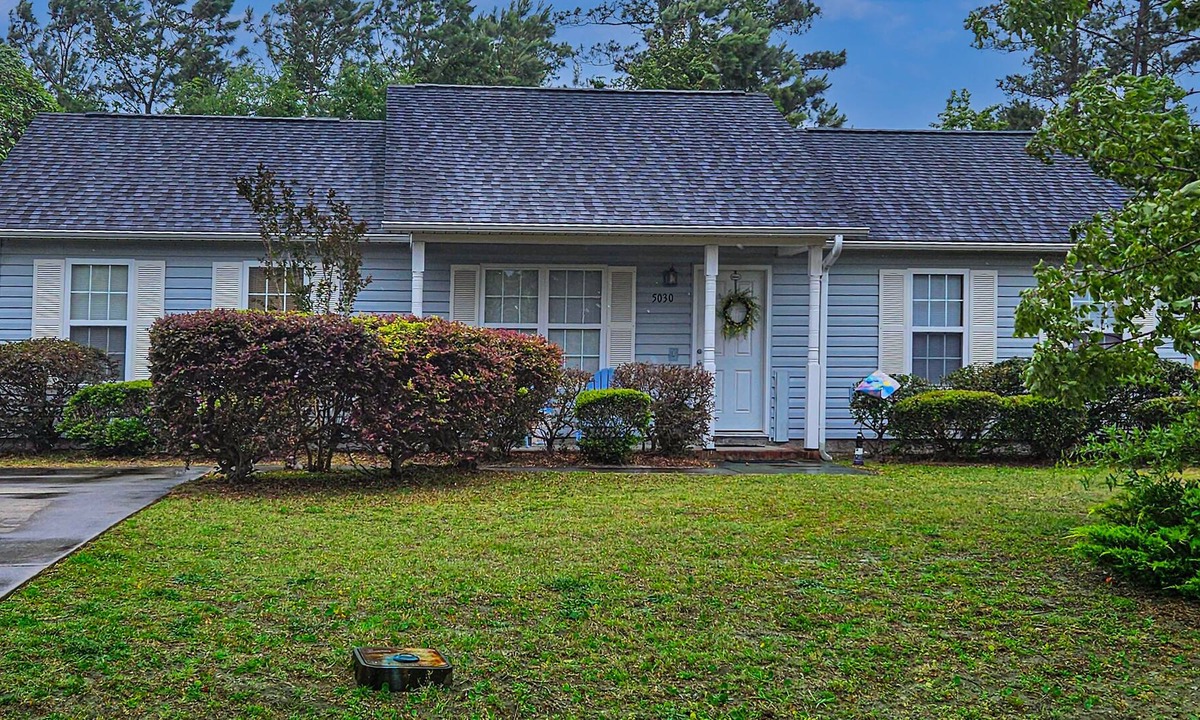 Southport House | Charming dog-friendly home with pool access, screened patio, cozy deck & W/D