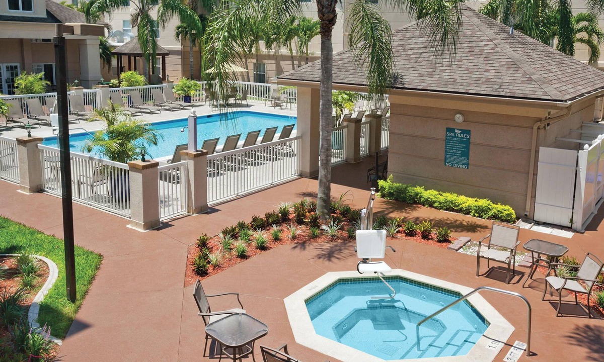 Villas Apartment | Enjoy Free Breakfast and Parking! 4 Classy Units, Steps to Bell Tower Shops!