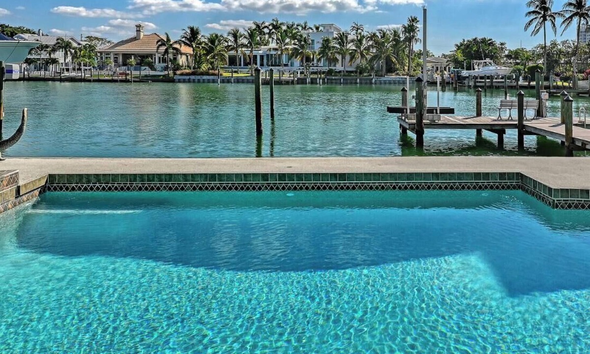 Sarasota House | Gorgeous Canalfront Home w/Heated Pool 5-Min Walk to Lido Beach Boat Dock