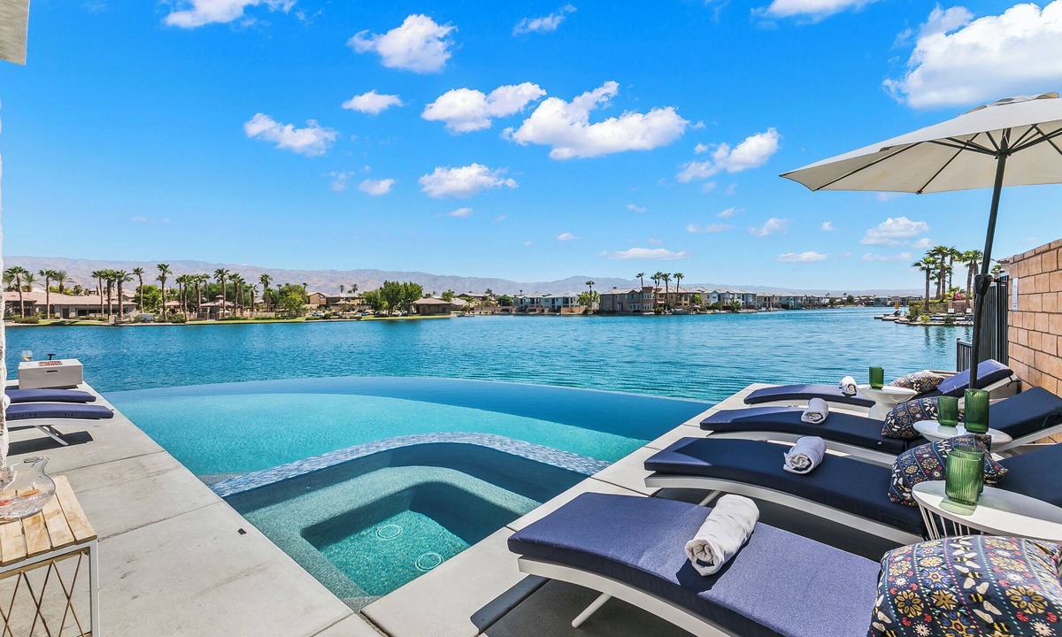 Terra Lago House | Infinity; Lakefront 5-Bedroom with Infinity Pool, Pet Friendly, & Fun Filled!
