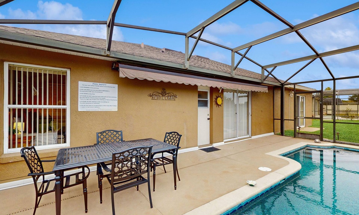 Crescent Lakes House | Inviting pool home with tranquil pond view near theme parks & attractions