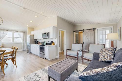 North Truro House | Oceanfront hotel suite at beachfront Sandbars Inn with balcony AC & firepit