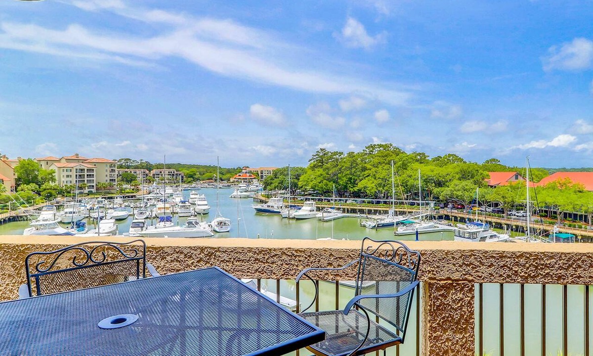 Shelter Cove Condo | Penthouse living at Shelter Cove Marina with balcony, harbor view, pool & tennis