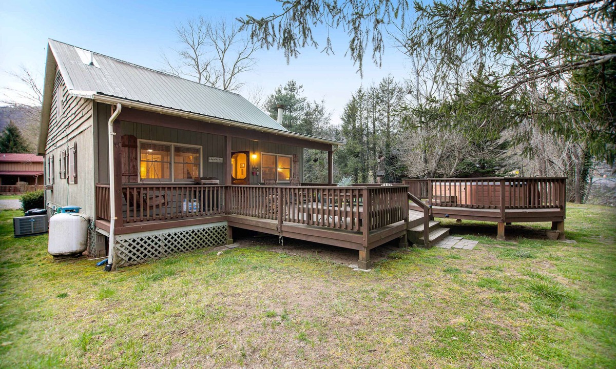 Cullowhee House | Quiet dog-friendly riverfront house with large back deck, hot tub, fireplace