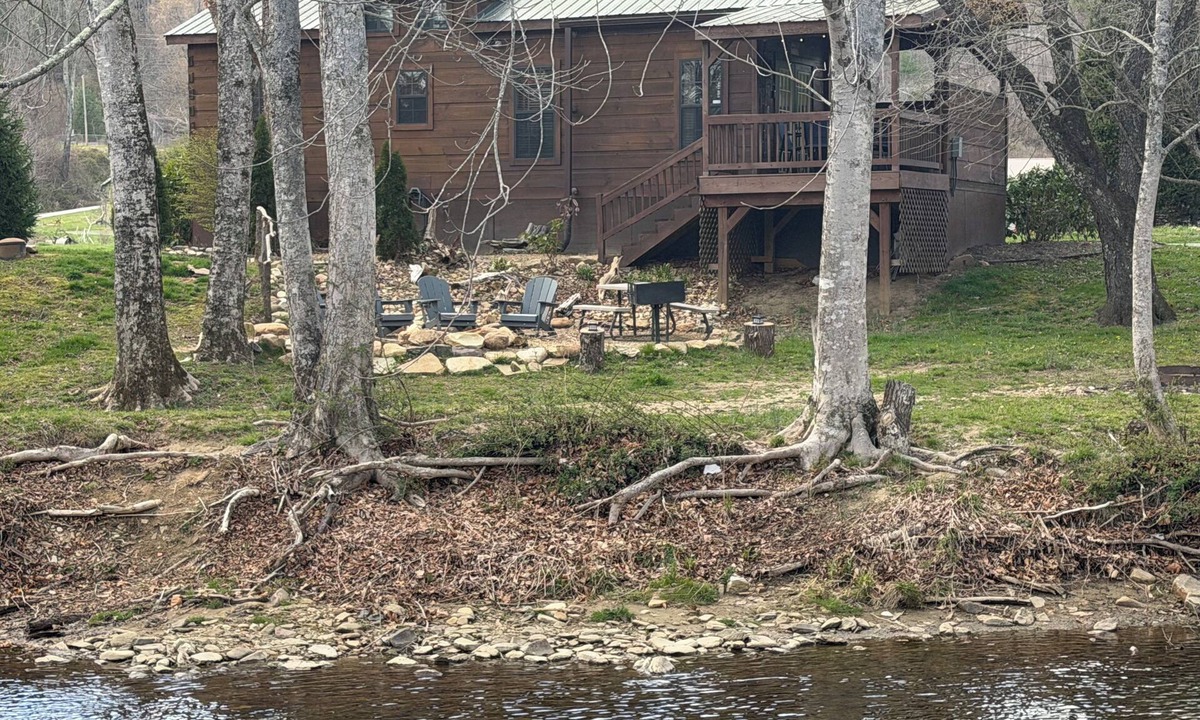 Altamont Cabin | Riverfront Escape: Fire Pit, private hot tub, river fun, sleeps 6