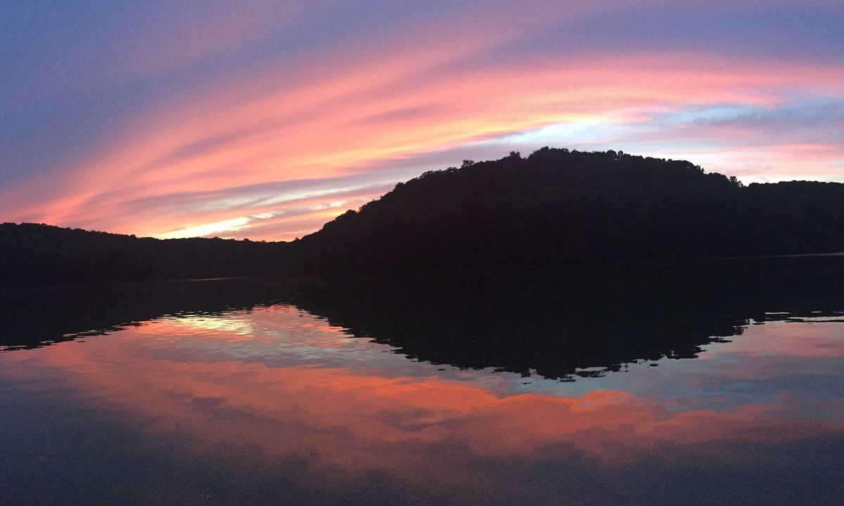 Glouster House | Secluded 5 BR brick ranch with a panoramic view of the lake through the trees