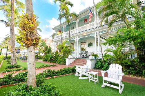 Uptown - Upper Duval Bed & Breakfast | Southernmost Point Guest House & Garden Bar