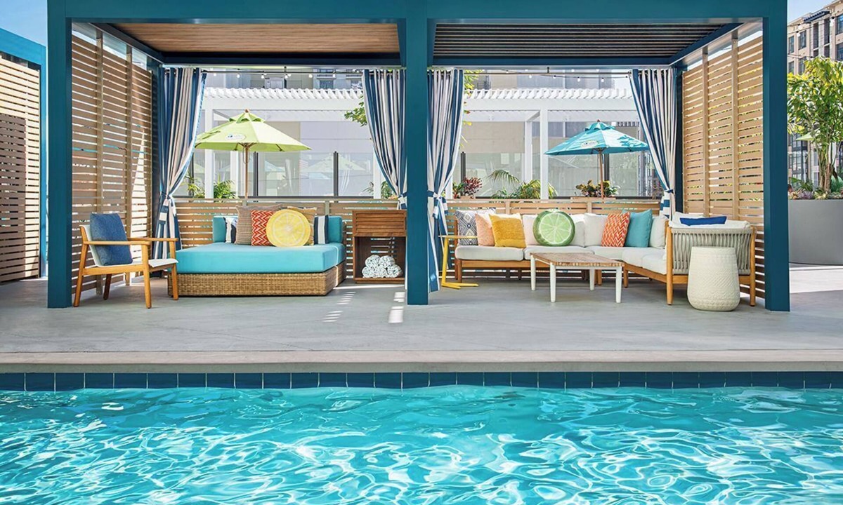 East Village Hotel | Sunny Escape with Vibrant Live Music & Poolside Bar