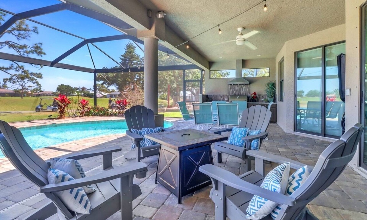 Burnt Store Villa | Tee Times and Tan Lines 1006 4 BR Heated Pool & Spa Retreat on Coral Oaks Golf Course