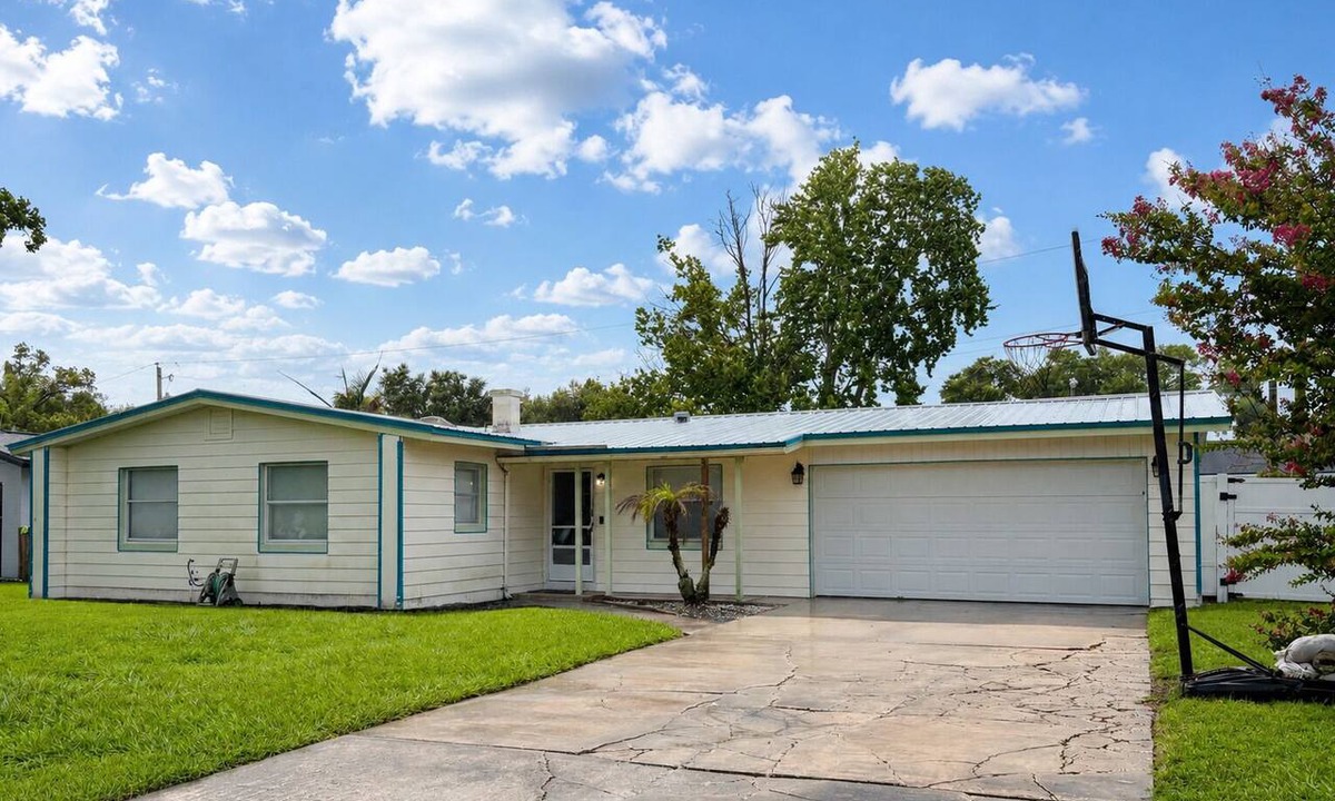 Goldenrod House | The Canopy on Periwinkle- A Home Away From Home