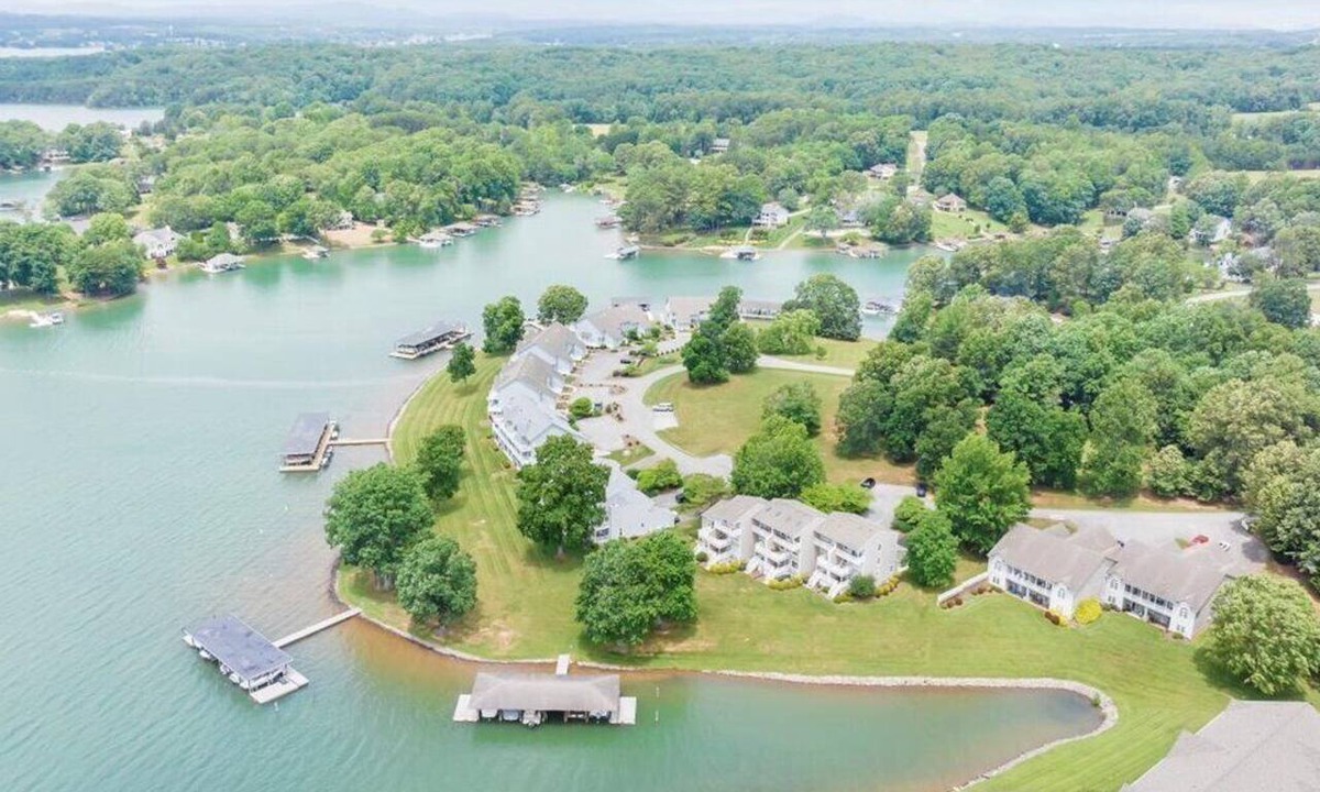 Huddleston House | The full Smith Mountain Lakefront experience: private boat slip, 3 balconies, game room, community pool & beach, propane grill, and pets welcome. No resort fees, ever.