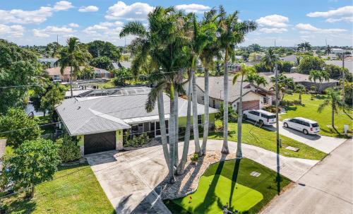 Caloosahatchee House | Waterfront Caribbean-Vibe Paradise with Heated Pool and Boat Dock
