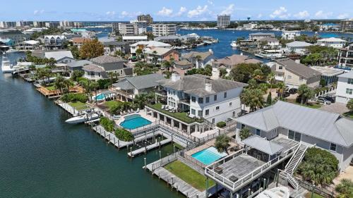 Holiday Isle House | Waterfront Dream House Pool Golf Cart & Dock
