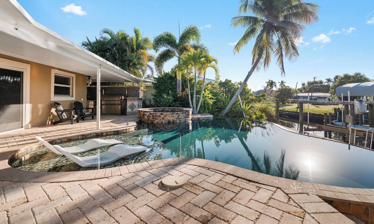 McGregor House | Waterfront Luxury: Pool, Dock, Hot Tub & Outdoor Kitchen