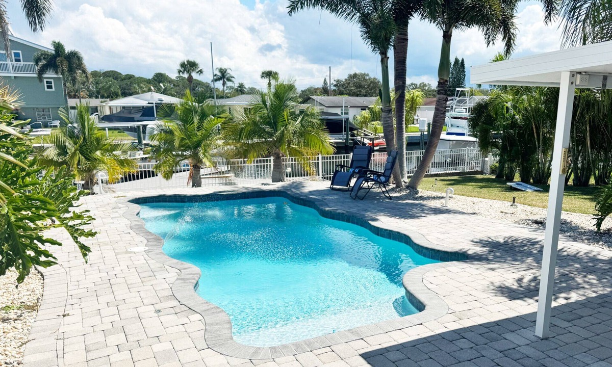 Flor-a-mar House | Waterfront Oasis w/heated Pool Dock Kayaks Fishing