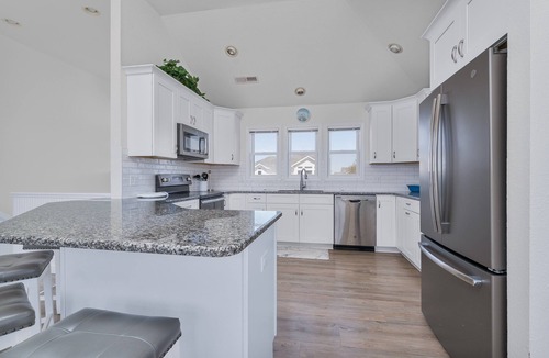 Ocean Sands House | 1772 - Dunes and Roses - Ocean Sands Retreat | Pool, Hot Tub & Lake