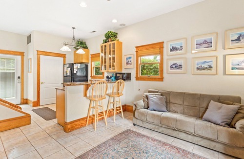 Historic Downtown Manteo House | 1BR historic cottage w/fireplace, patio & tub