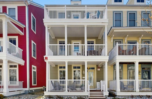Sunset Island Condo | 4-story townhome with resort pools, beaches, water access, & great location