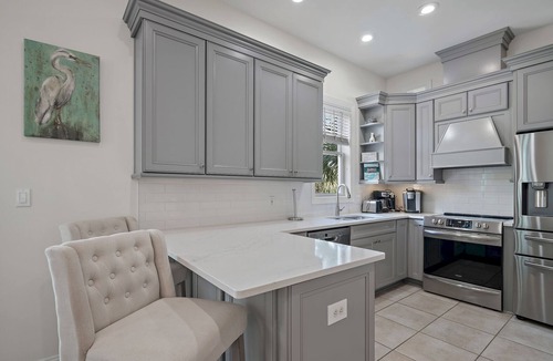Holiday Isle House | 4BR Beach House with Kayaks, Paddle Boards + 3 Resort Pools | Happy Days