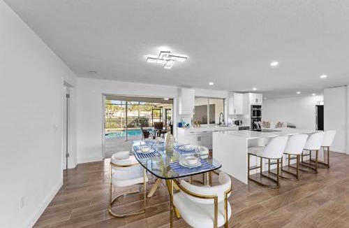 Town and River House | 4BR Waterfront Home w Heated Pool & Private Dock
