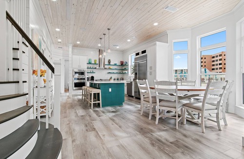 Holiday Isle House | 5 Bedroom Gulf Front Home with Seasonal Beach Service & Bikes | Land Zen