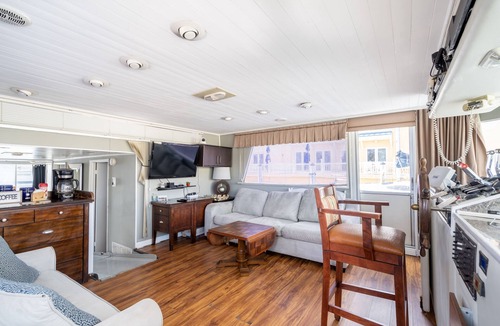 North Fort Myers Boat Rental | 65' Yacht Escape on Private Canal. Fish & Kayak. Support InclusiveInc.org
