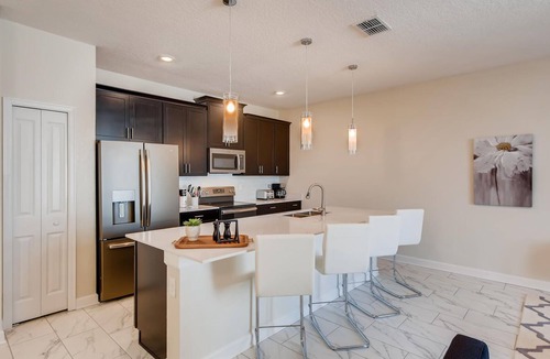 Four Corners Villa | 8953 CC - 4BR Townhome with Sparkling Pool