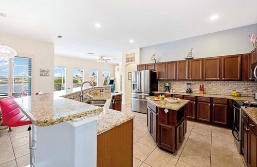 Fort Myers House | Amalfi Shore - with a Serene Freshwater Canal View - Vesteva