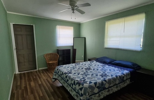 Bayou Oaks House | Art Haven Retreat - Open Plan Home with Sun Room and Fenced Yard