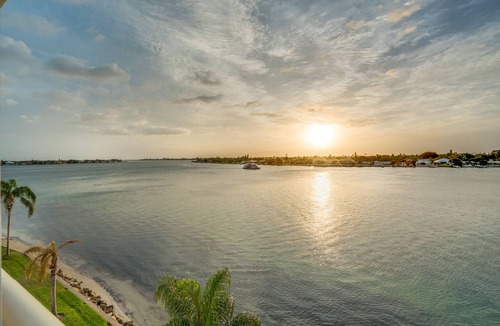 St. Petersburg Condo | Bahia Vista 8-314 | Balcony with Water Views, Resort Pool + Hot Tub