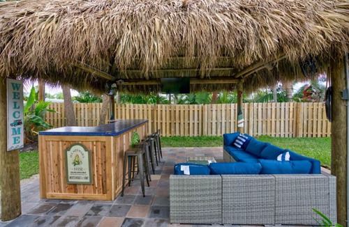 North Palm Beach House | Beach, Heated Pool, Tiki Lounge Tradewind Home