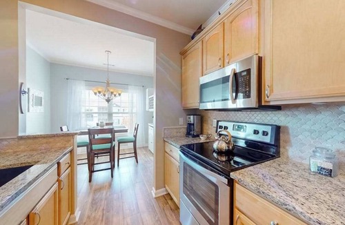 Villages of Five Points Condo | Beautiful condo near ocean with pool, fast WiFi, central AC & washer/dryer