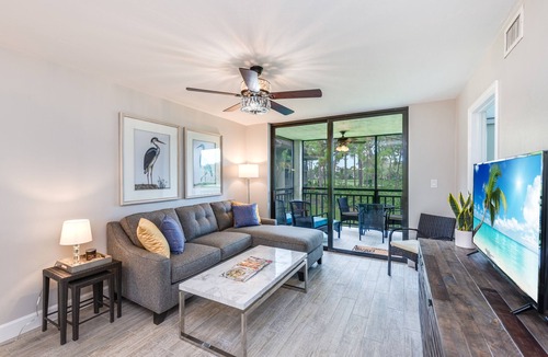 Bonita Bay Condo | Beautiful Condo with great views of lake & golf course, access to Private Beach