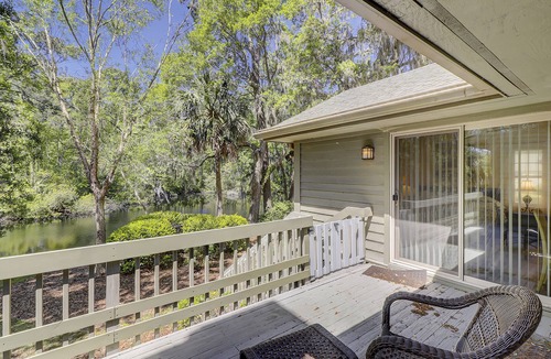Sea Pines Condo | Beautiful villa with deck & shared pool, hot tub, tennis courts, sauna & more
