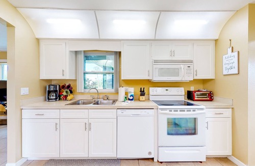 Pebble Beach House | Blue sky retreat near the water with updated living quarters, beach gear, and AC