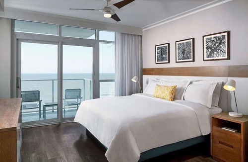 Downtown Myrtle Beach Hotel | Bright Family Suite with Balcony & Kitchen Near Popular Entertainment Spots