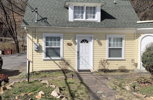 Berkeley Springs Cottage | Brookside Cottage is a beautiful open concept doll house stay for two.
