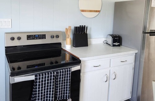 West Ocean City House | Canal-front home with fast WiFi, central ac, and private dock