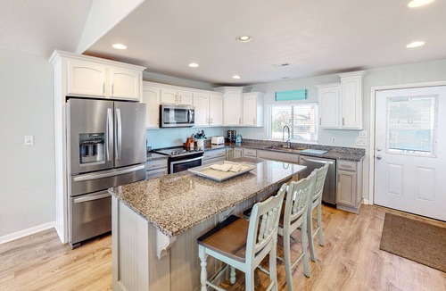 Sandbridge House | Canal-front home with private pool & views - 1 block to the beach