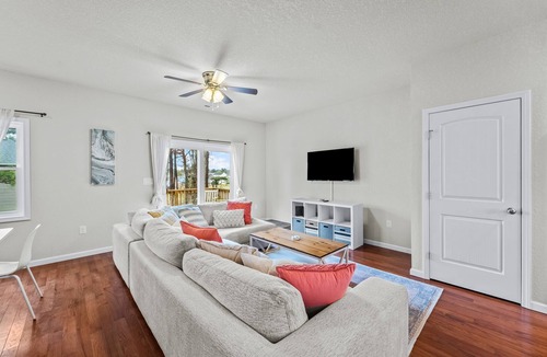 Colington Harbour House | Canal-view, dog-friendly home with private hot tub, deck & grill - near beach
