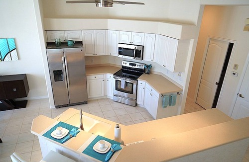 Pelican House | Central 1001 Waterfront 3BR heated Pool & Spa home w/Kayaks and Bicycles, Boat Dock