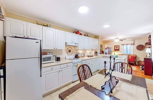 Mirror Lake House | Charming cabin with private deck, fireplace, central AC, & private W/D