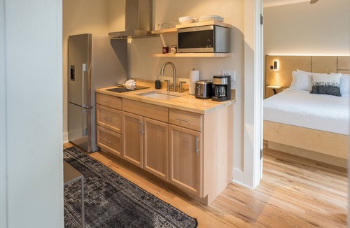 Historic Downtown Durango Hotel | Charming King One Bedroom Suite w/Kitchen + Living