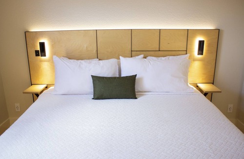 Historic Downtown Durango Hotel | Charming King One Bedroom Suite w/Kitchen + Living