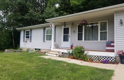 Rapid City House | Charming Torch Lake 3-bedroom 1 bath one floor Cabin