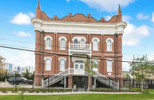 Tulane - Gravier Apartment | Chic 1BR in Historic School House | Gated Parking Included