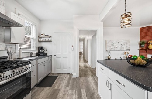 Brighton Heights Apartment | Clean, comfortable 2BR in a quiet neighborhood near downtown and stadiums. Guests love the spotless space, thoughtful touches, and fully stocked kitchen. Enjoy fast WiFi, smart TVs, easy check-in, free parking, plus a porch and private balcony.